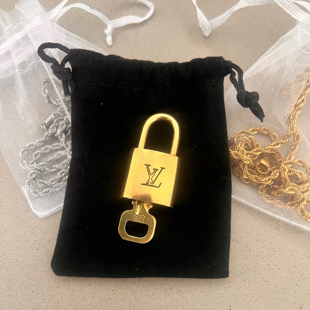 Authentic LV Lock and Key set with 2 unbranded 27” chains
